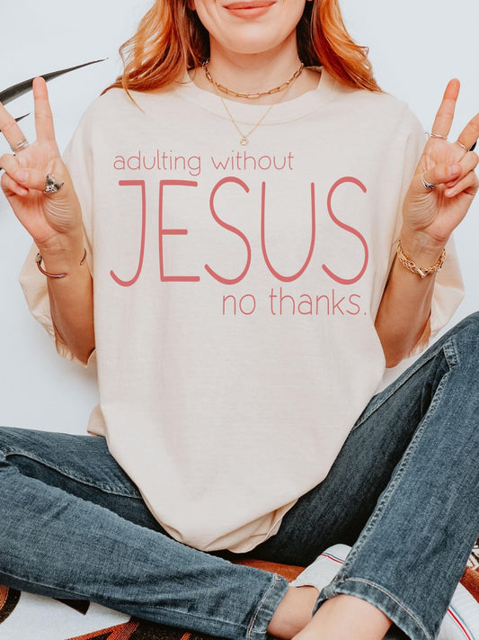 Adulting Without Jesus shirt in earthy tones on Comfort Colors tee a religious top ideal for Christian women who love wearing Bible verse and faith inspired messages