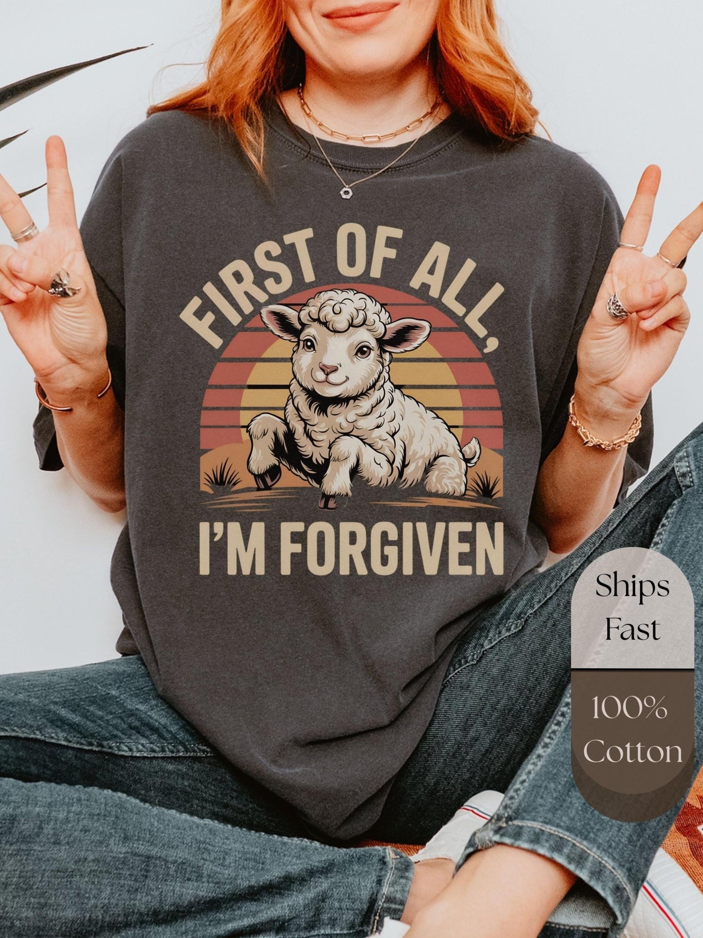 a woman sitting on the floor wearing a shirt that says first of all i '