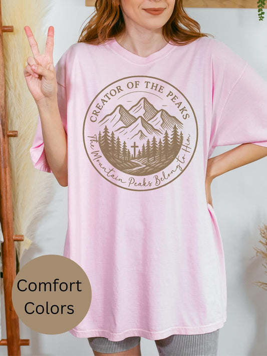 Comfort Colors Creator of the Peaks Christian t-shirt with mountain and cross design, perfect for hikers, campers, and faith-based outdoor lovers looking for Scripture-inspired style.