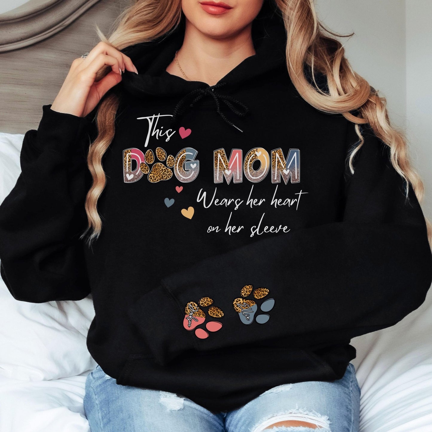 Leopard print custom paw print sweatshirt for dog moms, featuring personalized names, a perfect gift for dog lovers and pet owners who adore their pups.