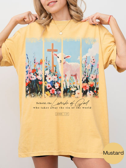 a woman wearing a yellow t - shirt with a picture of a sheep on it