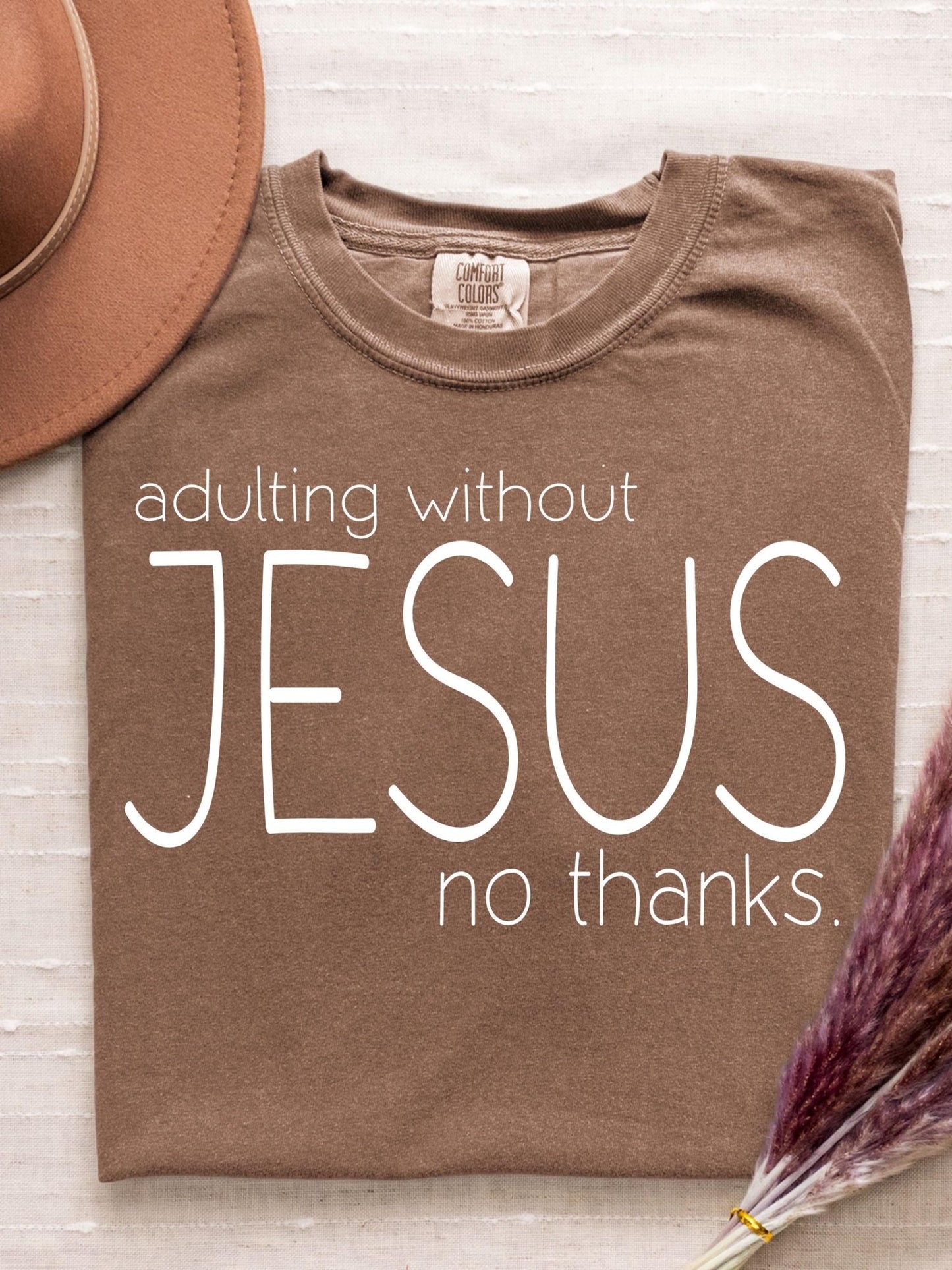 Soft cotton Comfort Colors tee with spiritual saying perfect for Christian gifting bold adulting without Jesus design speaks to modern faith lifestyle and belief