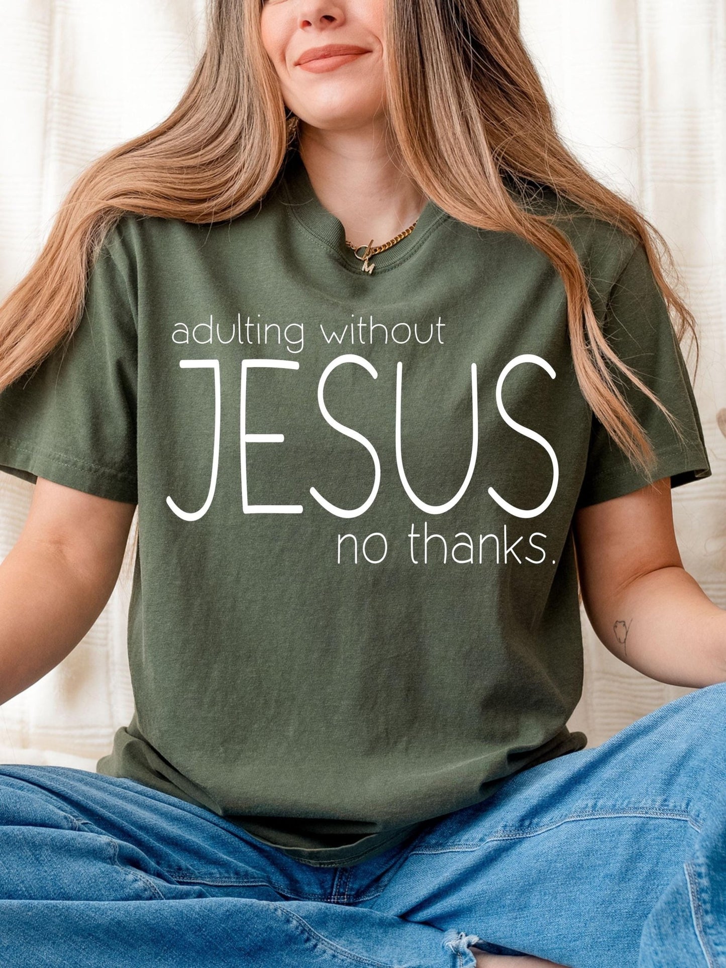 Religious Comfort Colors shirt featuring bold typography Adulting Without Jesus great as a faith gift or personal statement for spiritual adults navigating life