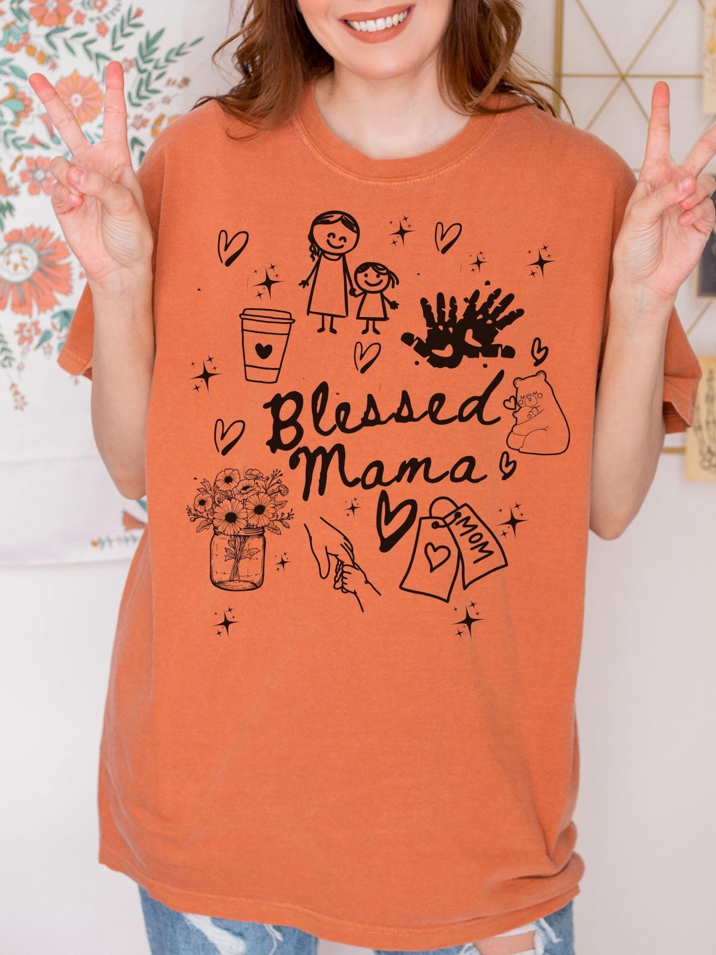 Soft cotton Blessed Mama tee illustrated with coffee cups and hearts, trending Mother’s Day graphic shirt that makes your mom feel loved, appreciated, and stylish