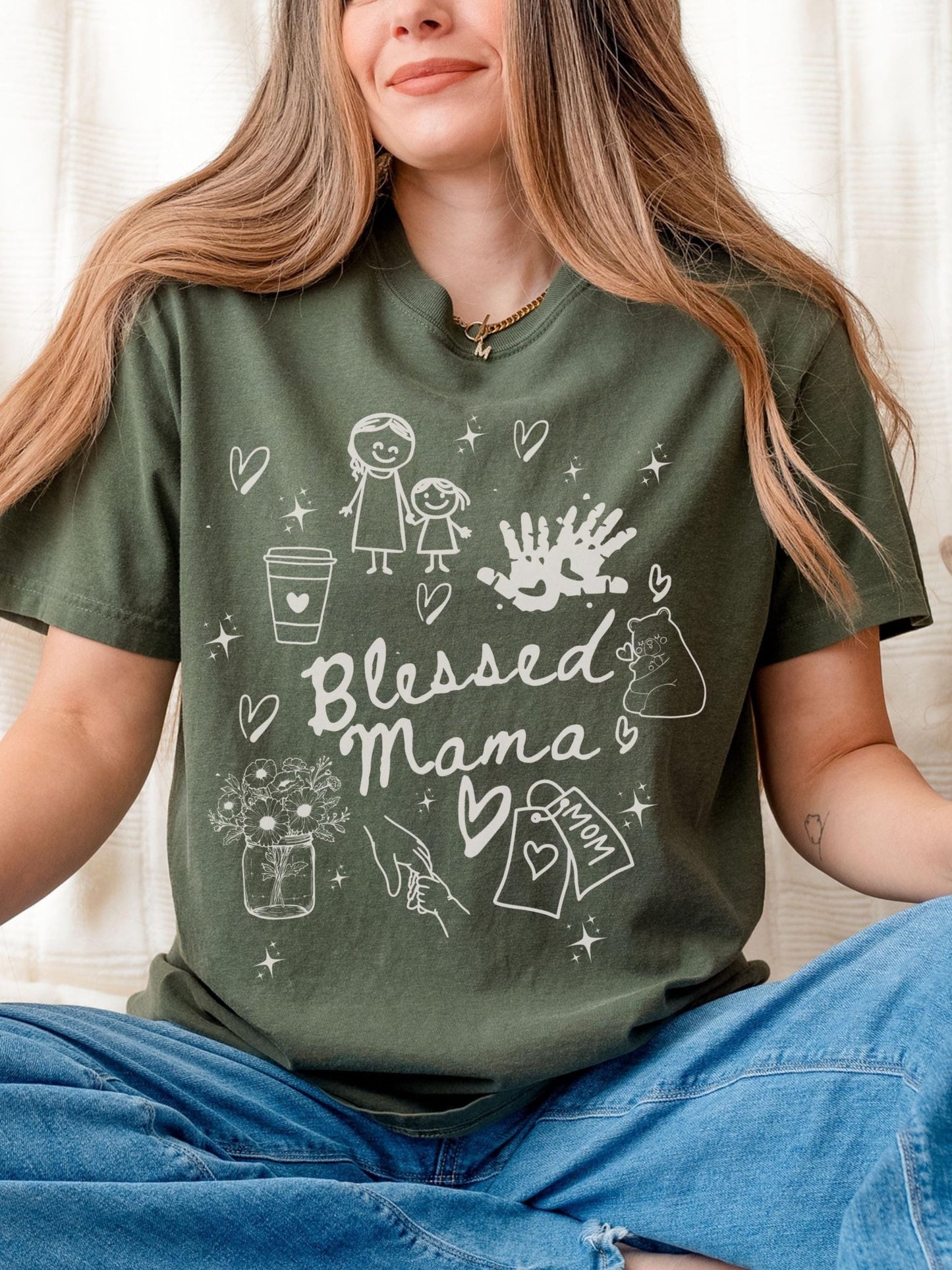 Ivory doodle Blessed Mama t-shirt featuring coffee cup, hearts, handprints and flowers, designed as a cozy and heartfelt present for Mother’s Day, birthdays, or baby showers