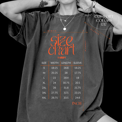 a woman wearing a black shirt with a calendar on it