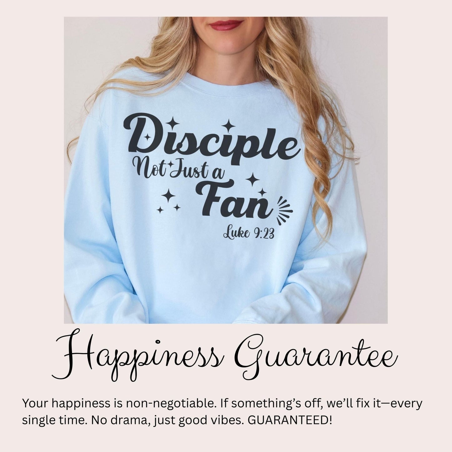 A woman wearing a light blue sweatshirt with the text &quot;Disciples Not Just Fans&quot; printed on it.