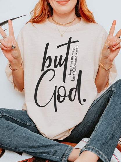 Inspirational Christian shirt for her or him with But God lettering printed on a comfy oversized tee suitable for church events or everyday wear