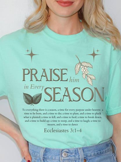 Praise Him in Every Season graphic shirt with leaves and grapevine elements made for women of faith seeking a religious and stylish Christian apparel piece