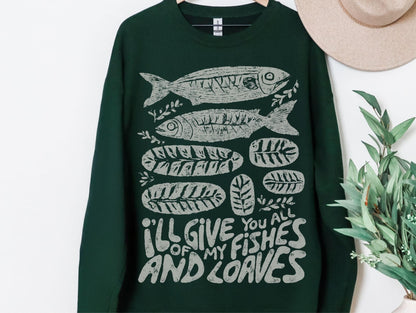 A dark green sweatshirt with a graphic design of fish and leaves, along with the text &quot;I&#39;ll give you all of my fish and leaves&quot;.