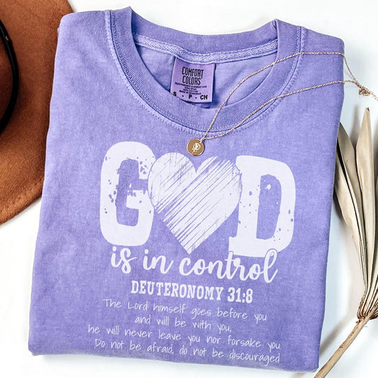 Christian mom t-shirt with God Is in Control design perfect for those who trust in God and seek to express their faith through stylish clothing