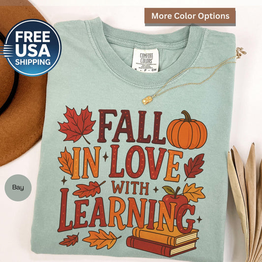 fall in love with learning shirt flatlay