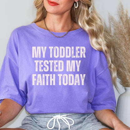 Womens faith-based tshirt with a trendy design that speaks to mothers balancing parenting and faith a unique Christian gift for her that is both fashionable and meaningful for daily wear