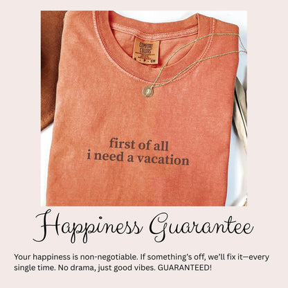 a red t-shirt with the text "first of all I need a vacation" printed on it.