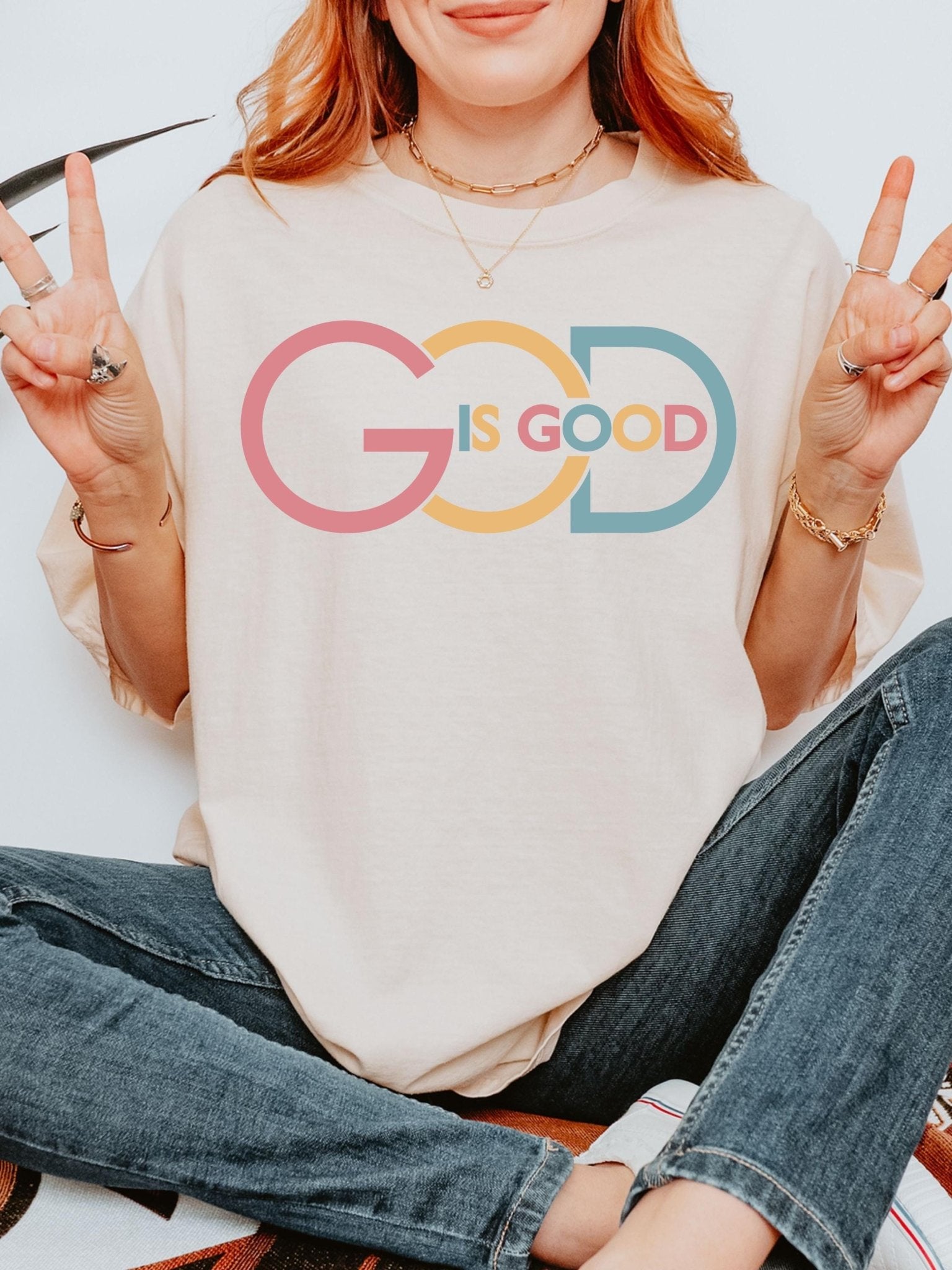 Positive faith shirt with God Is Good design in colorful typography great for encouraging Christian gifts for mom dad or youth pastor