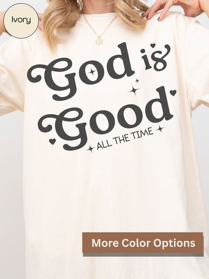 A person wearing a white t-shirt with the text "God is Good" printed on it.