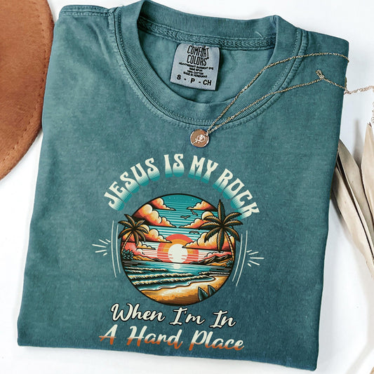 Christian Beach Shirt with a vintage retro sunset and “Jesus Is My Rock” text, a faith-based Comfort Colors tee for believers.