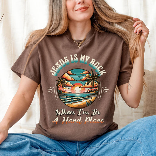 Religious Graphic Cotton T-Shirt featuring a coastal sunset design and scripture-inspired message, perfect for Christian men and women.