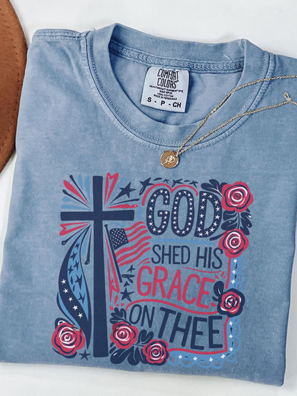 Independence Day Christian shirt for her with American flag cross and roses celebrating faith and freedom ideal for patriotic holidays or parades