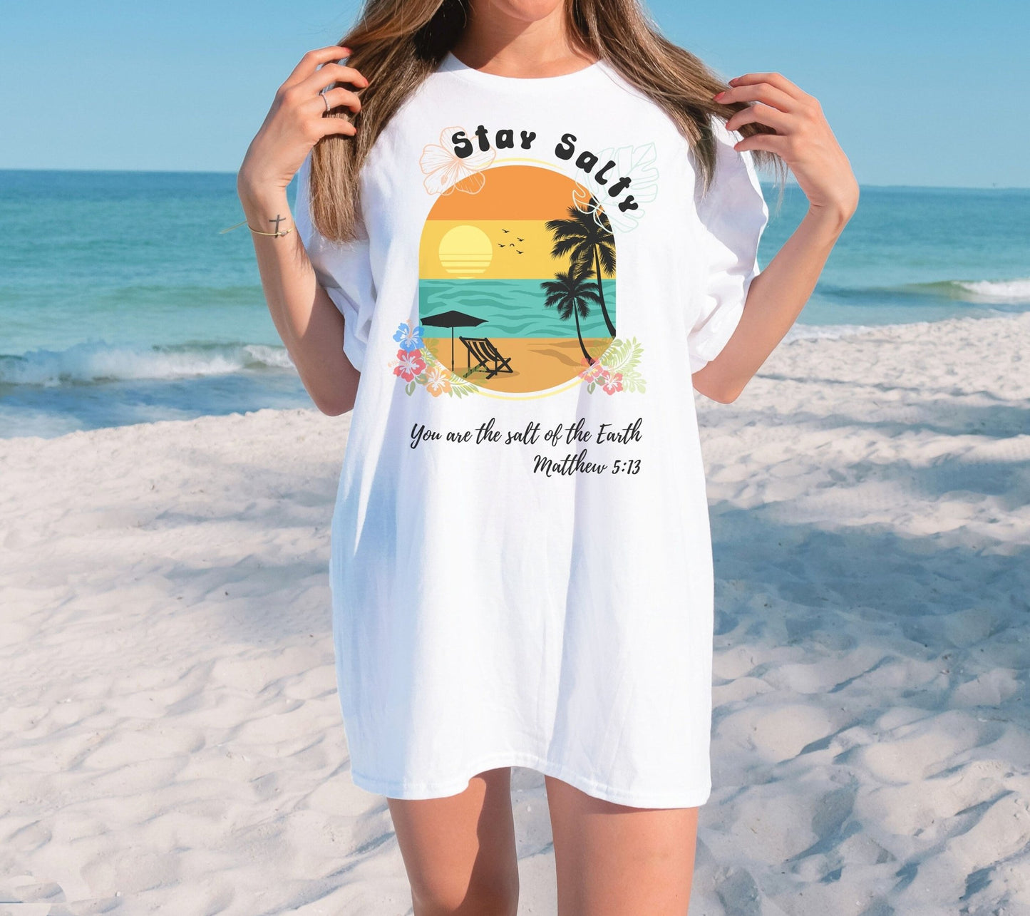 Christian beach t-shirt with the Stay Salty graphic based on Matthew 5:13. This inspirational summer tee is perfect for vacations or casual outings, offering both comfort and a meaningful message.