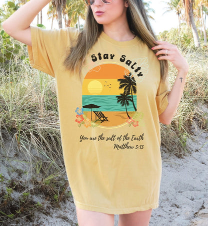 This Bible verse vacation t-shirt features Matthew 5:13 and the Stay Salty design. A perfect Christian summer tee for beach days, vacations, or simply sharing your faith in a fun and stylish way.