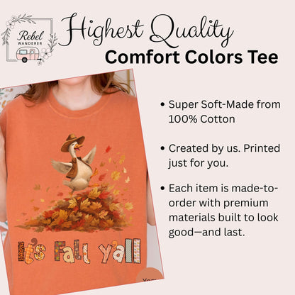 The image is a promotional graphic for a t-shirt featuring a cartoon goose surrounded by autumn leaves. The text highlights the t-shirt as the &quot;HIGHEST QUALITY Comfort Colors Tee&quot; and emphasizes its softness, 100% cotton material, and custom-printed nature.